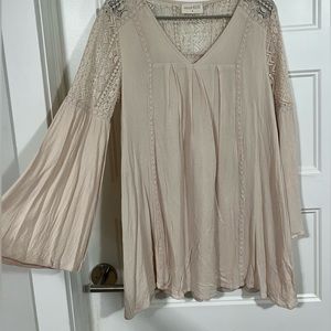Its a cream color, size small dress.